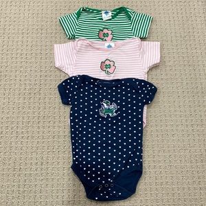 3 Notre Dame onsies. The blue is 6 months, the other toe are 6-9 months